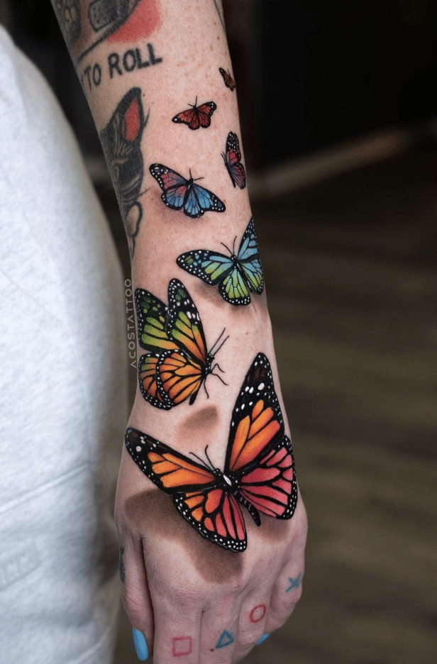 Lots Of Colorful Butterflies Tattoo