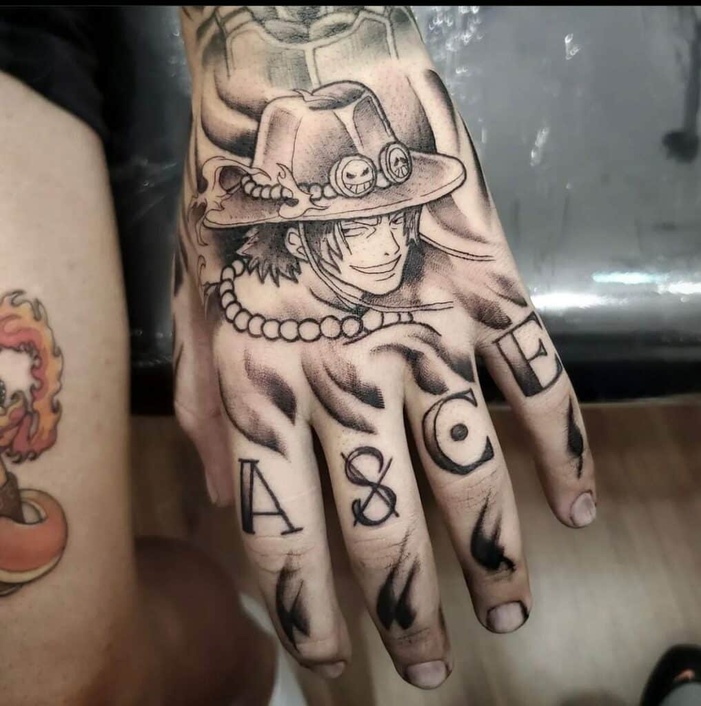 One Piece Hand Tattoo