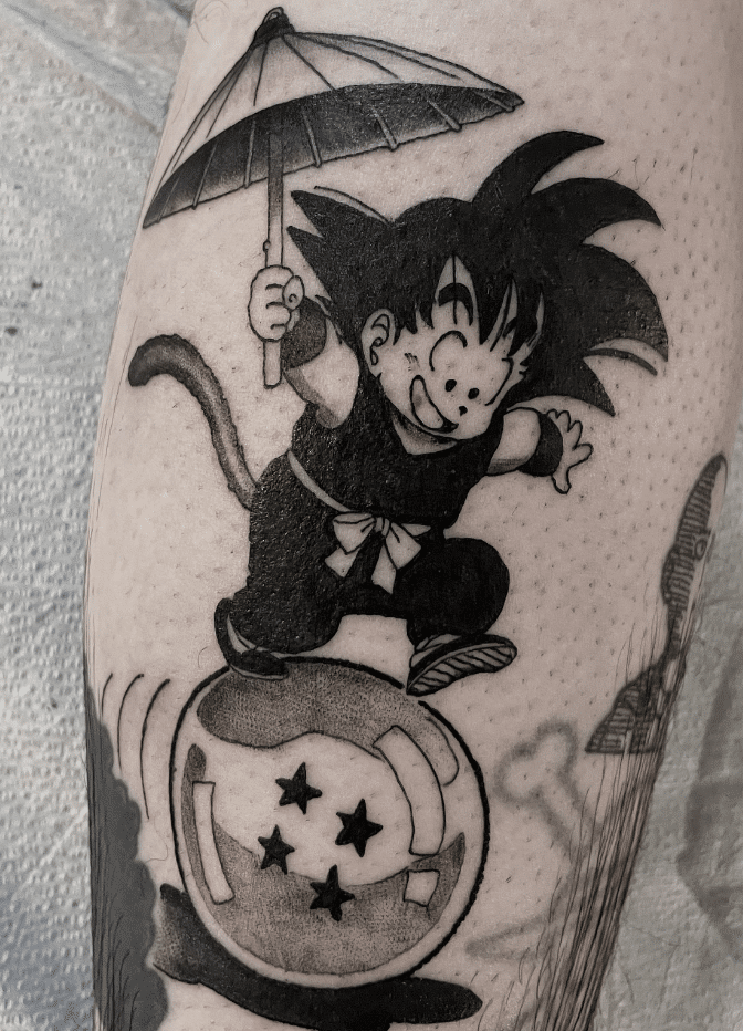 Playful Goku Tattoo