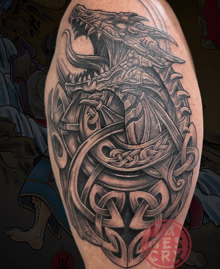 Realistic Dragon With Celtic Artwork Tattoo