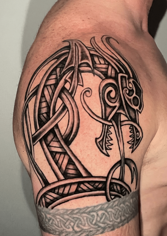 Shoulder With Celtic Dragon Tattoo Idea