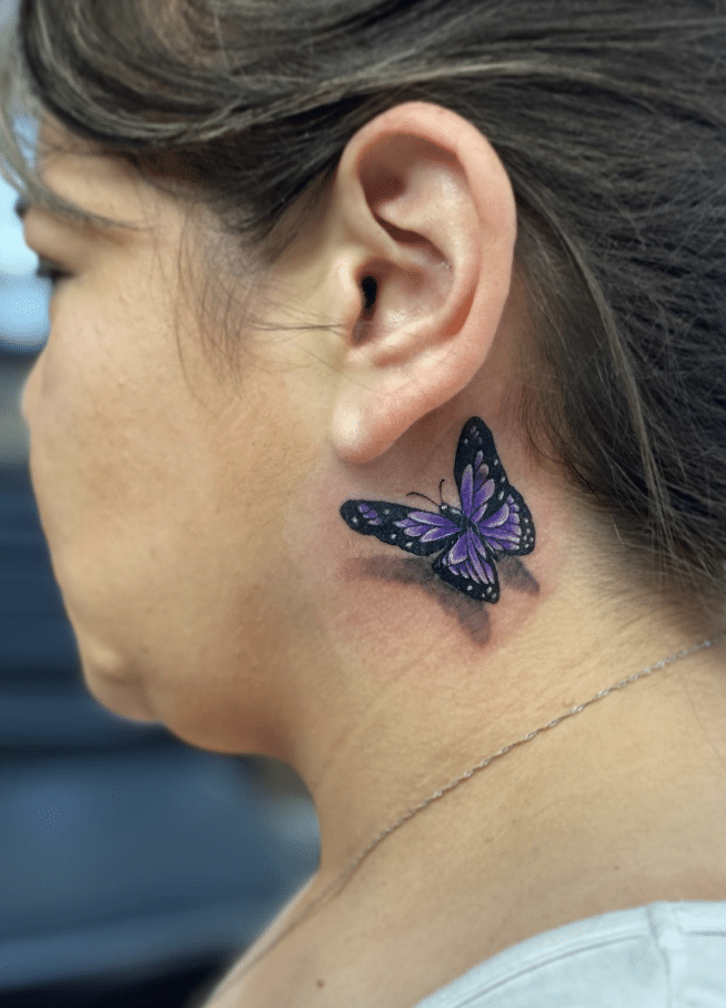 Stunning Purple Butterfly Tattoo On Ear