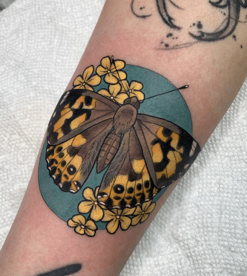 Stunning Yellow Butterfly Tattoo On Arm