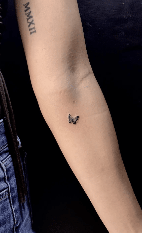 Tiny Simple Butterfly Tattoo