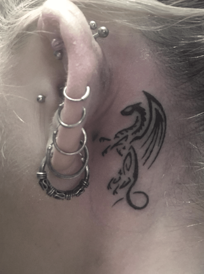 Tribal Dragon Tattoo Idea On The Ear