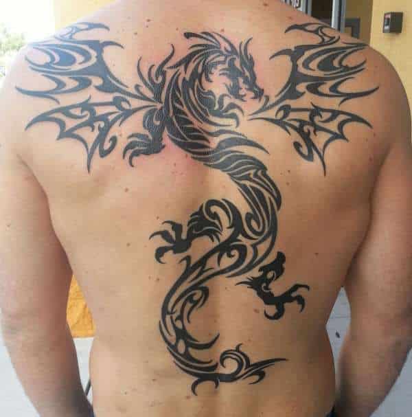 Tribal Dragon Tattoo On The Back