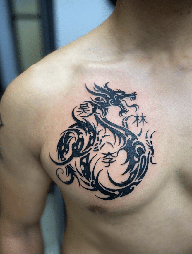 Tribal Dragon Tattoo On The Chest