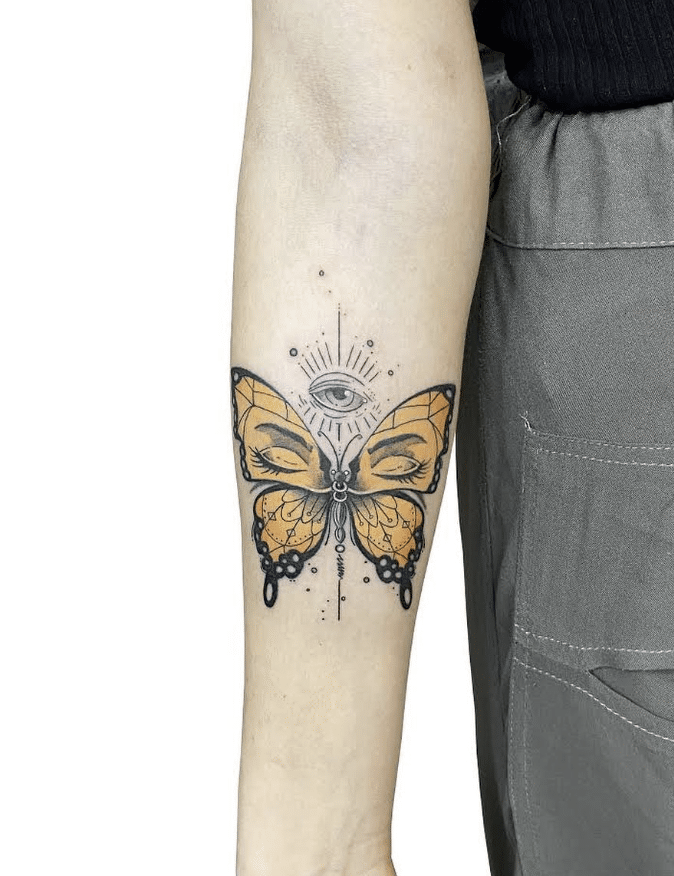 Yellow Butterfly Face Tattoo