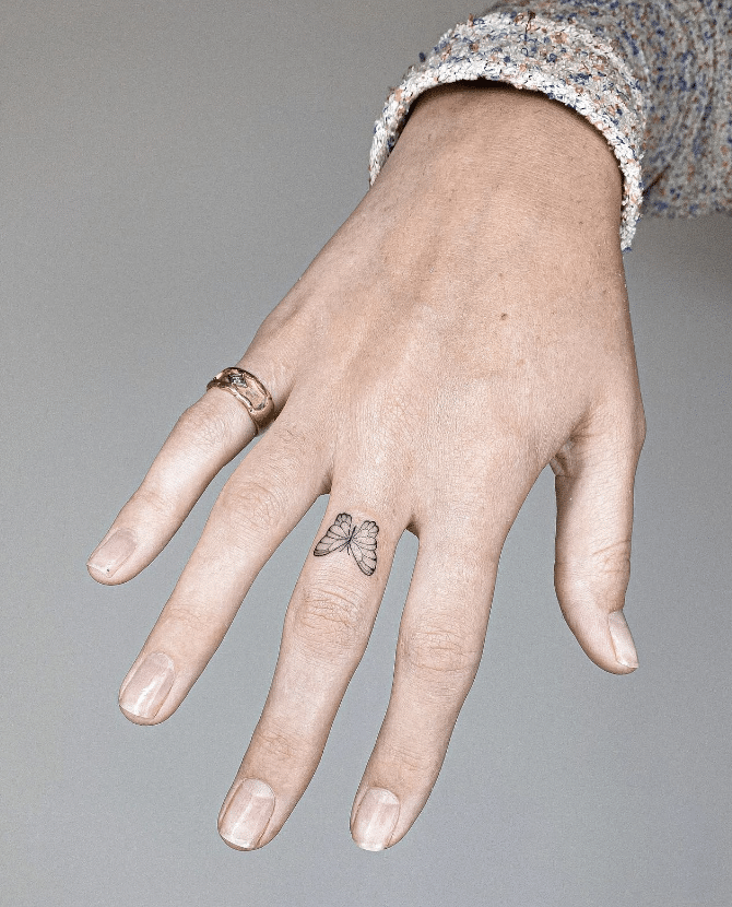 Butterfly Finger Tattoo