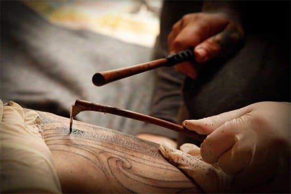 Chiseling tribal tattoo technique