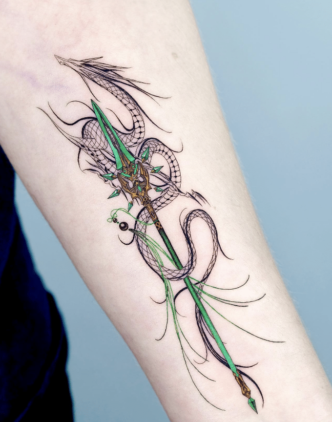 Dragon And Green Spear Tattoo