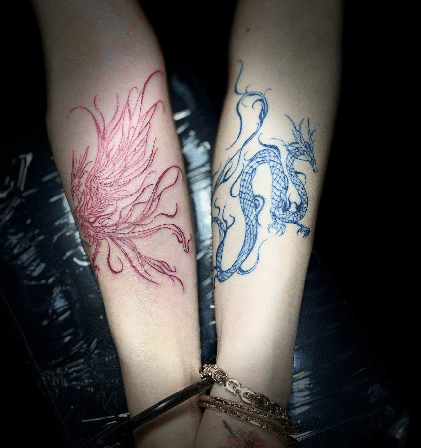 Dragon And Phoenix Tattoo On Forearm