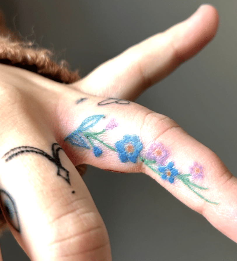 Floral Finger Tattoo
