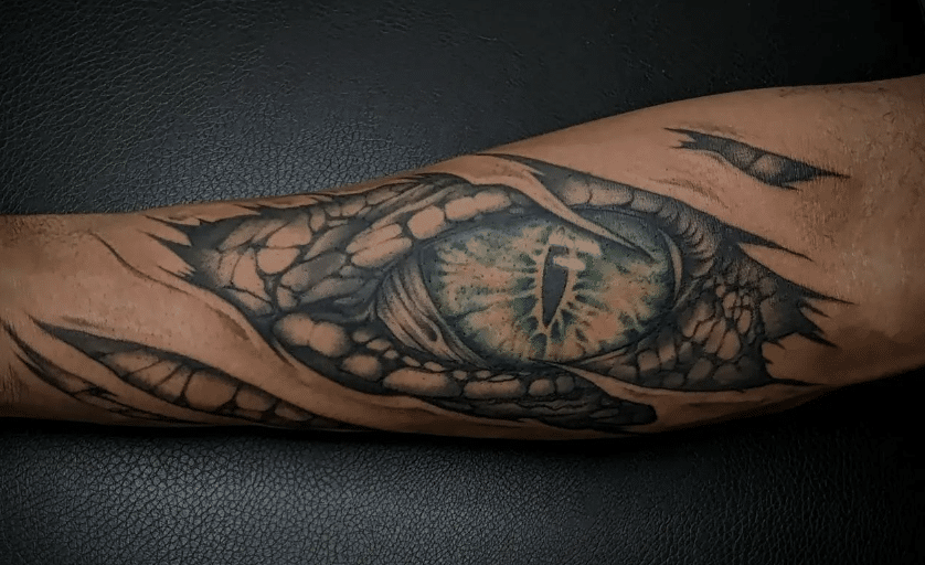 Green Dragon Eye Tattoo