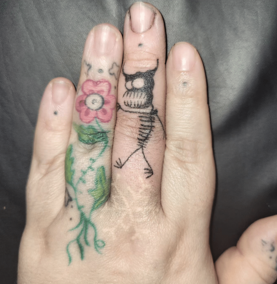 Monster Finger Tattoo