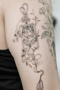 Poonkaros fineline tattoo artist