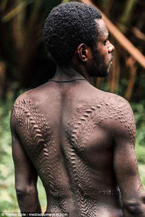 Skin Cutting tribal tattoo meaning