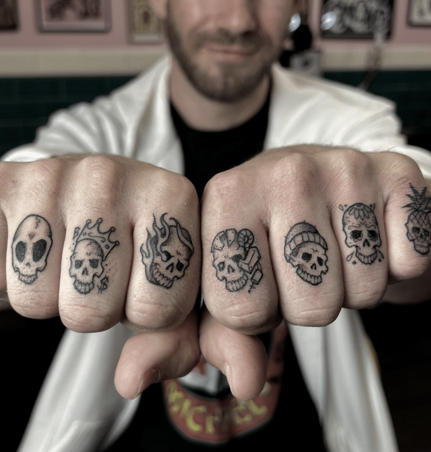 Skulls Finger Tattoo