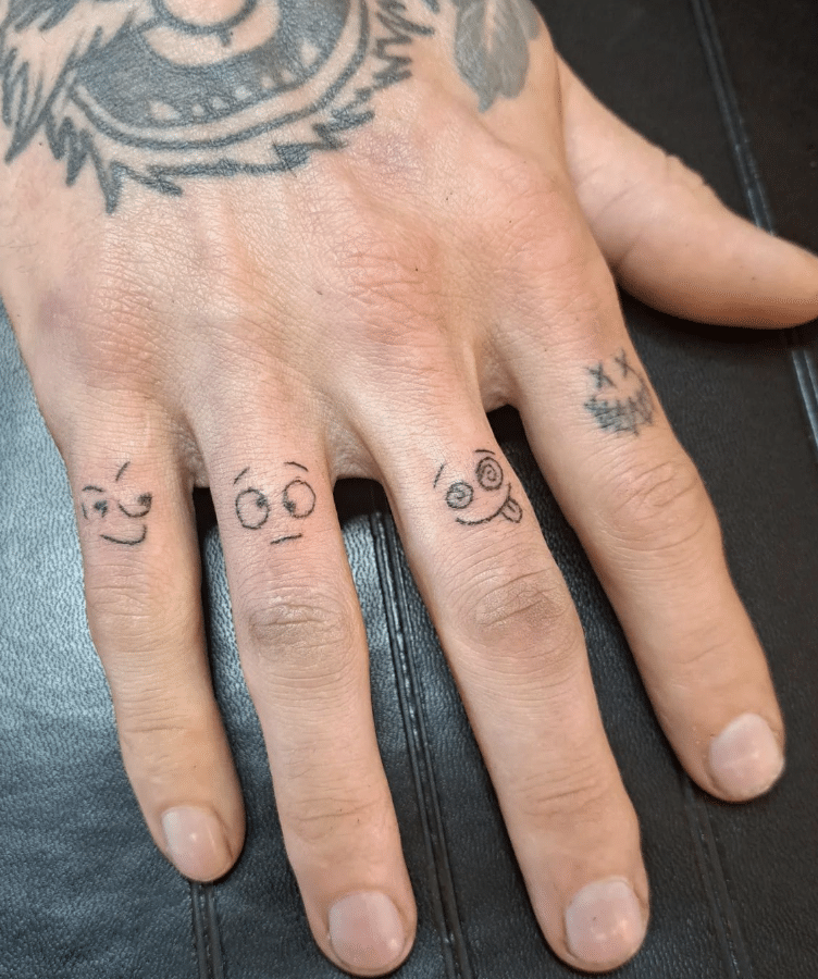 Smiley Faces Finger Tattoo