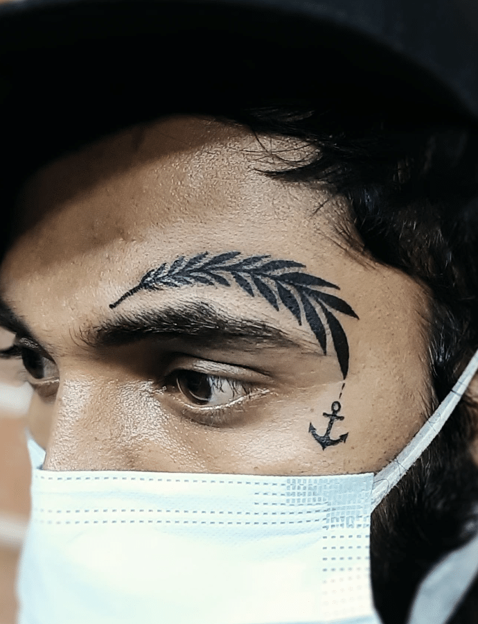 Anchor Tattoo On Face