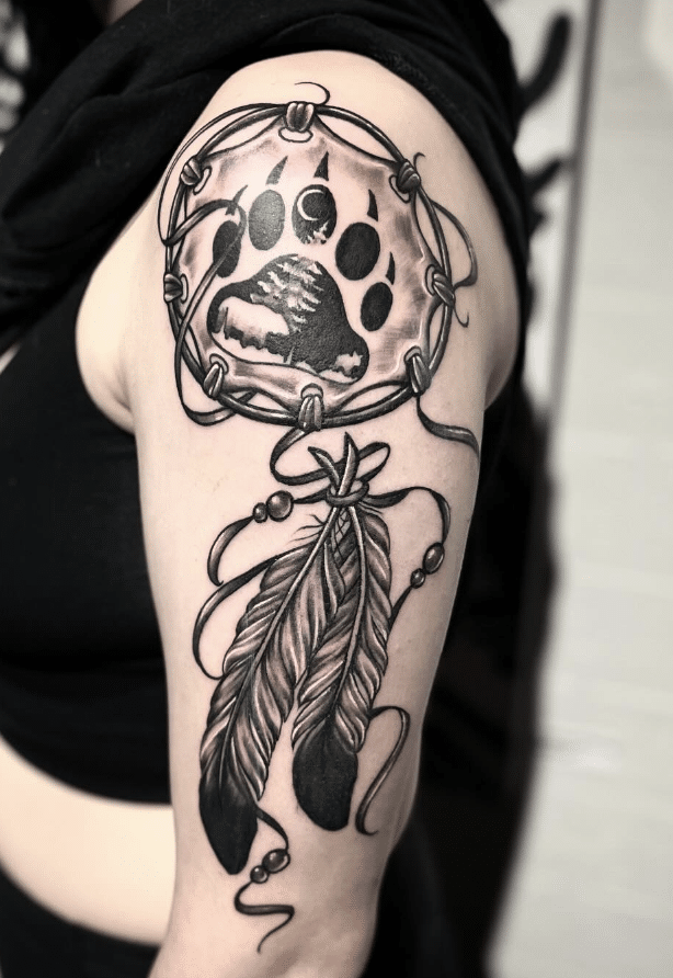 Arm Paw Print Tattoo