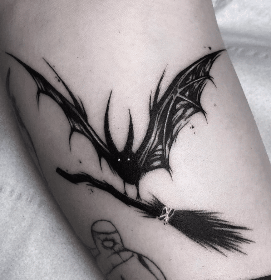 Bat Riding A Broom Tattoo