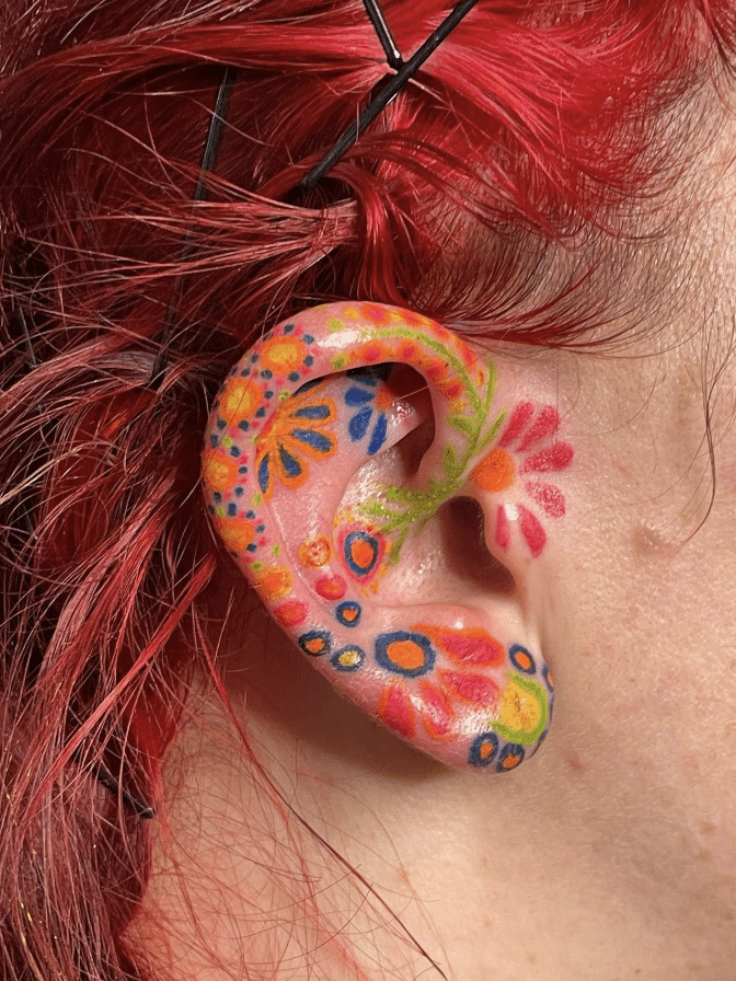 Colorful Ear Tattoo