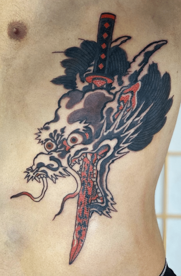Dragon Head Sword Tattoo