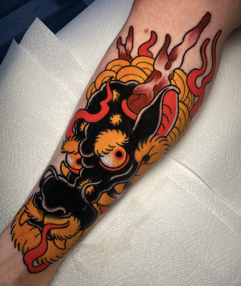 Dragon Head Tattoo On Forearm
