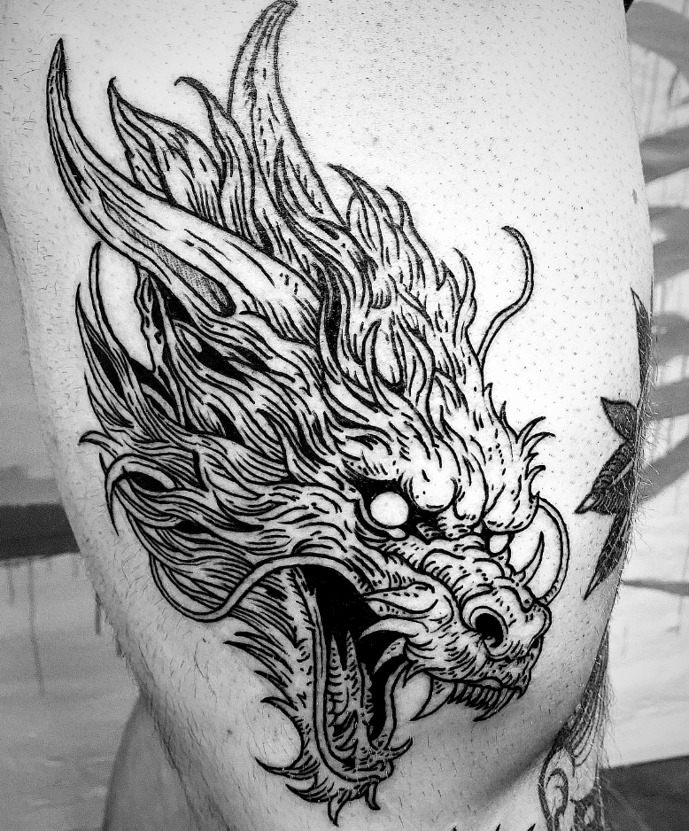 Dragon Head Tattoo On Thigh
