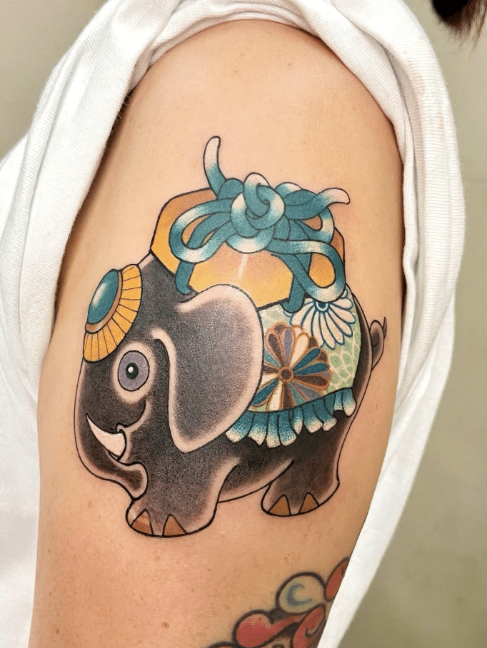 Elephant Present Tattoo