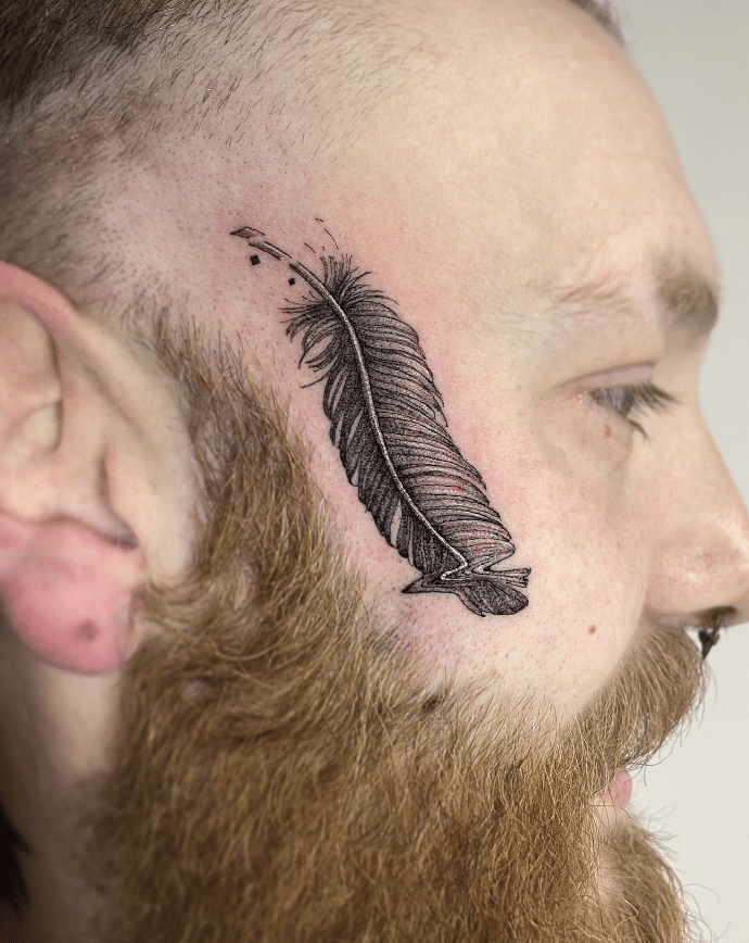 Feather Tattoo On Face