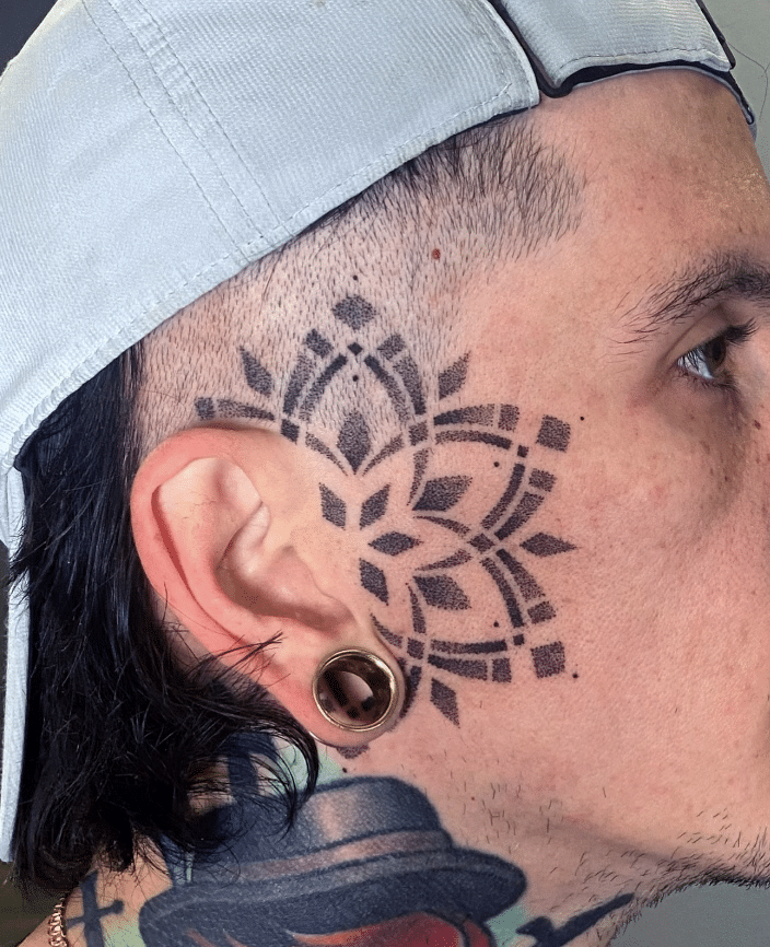 Geometric Face Tattoo