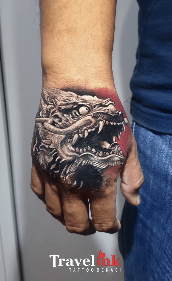 Hand Dragon Head Tattoo Idea