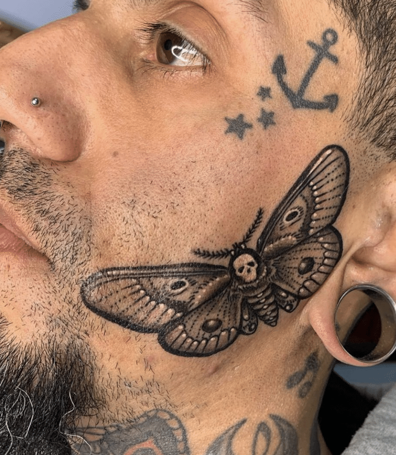 Moth Tattoo On Face