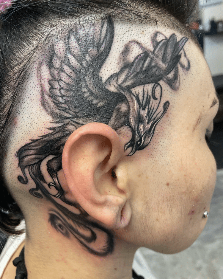 Phoenix Tattoo On Face