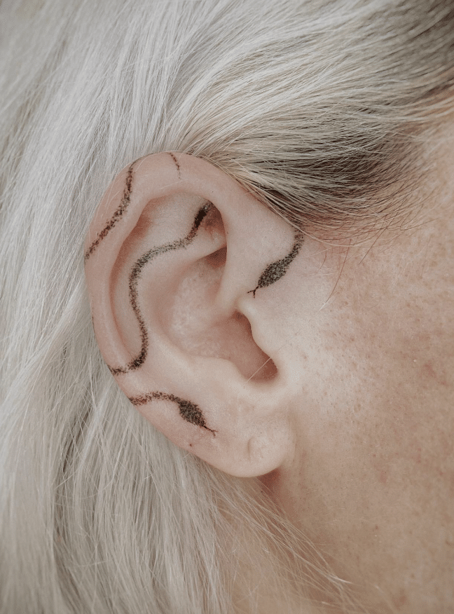 Snake On Ear Tattoo