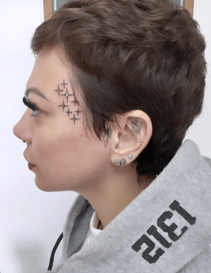 Sparkles Face Tattoo