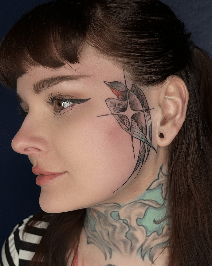 Swallow Tattoo On Face