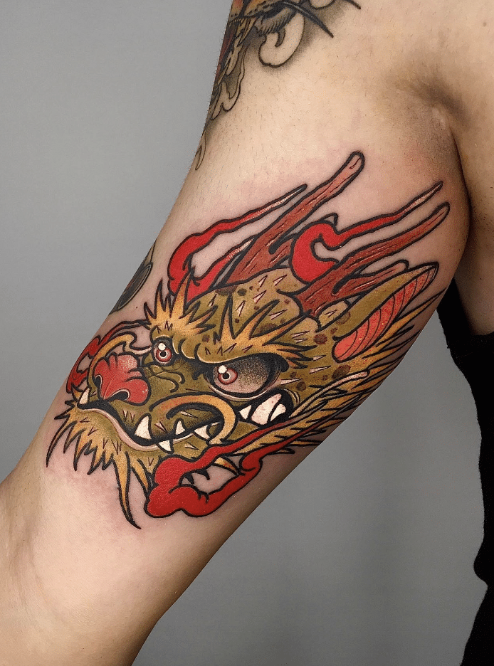 Yellow Dragon Head Tattoo